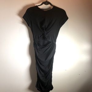 Beautiful Heart and Hips fitted black dress.